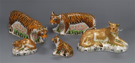 Five Royal Crown Derby paperweights - two tigers, a tiger cub, a lioness and lion cub